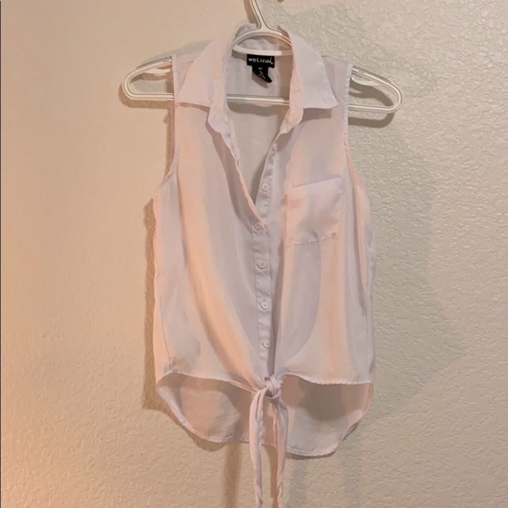 White sleeveless blouse